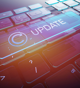 Tastatur eine modernen Notebooks mit einem Upload icon und dem Wort "Update".